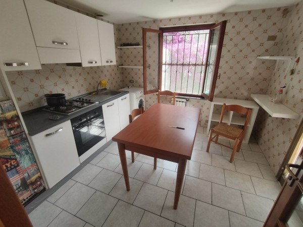 Ingrandisci la foto