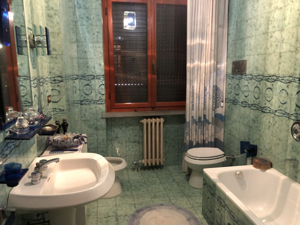 Ingrandisci la foto