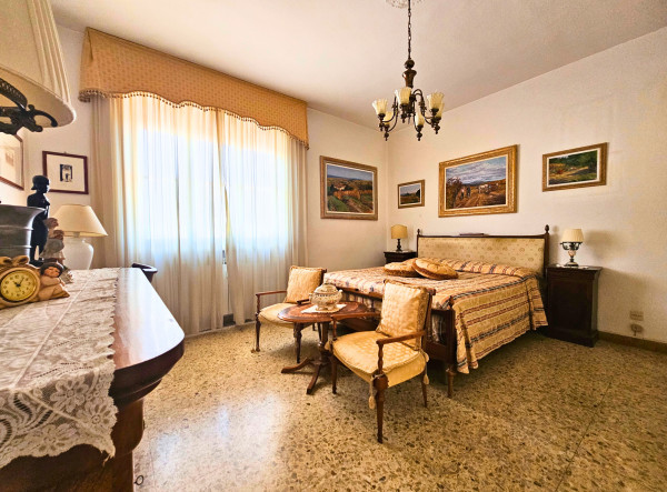 Ingrandisci la foto
