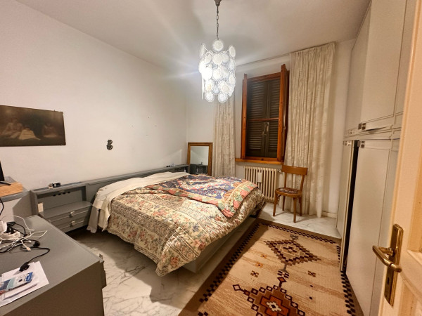 Ingrandisci la foto