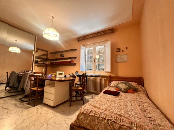 Ingrandisci la foto