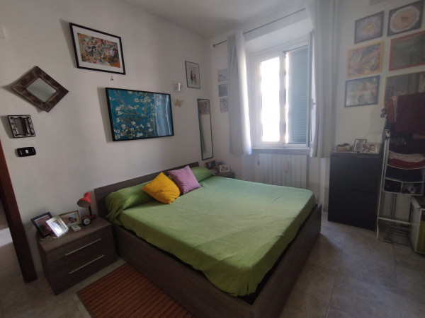 Ingrandisci la foto