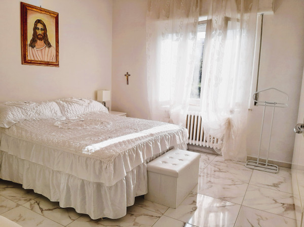 Ingrandisci la foto