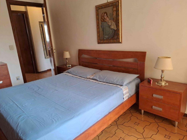Ingrandisci la foto
