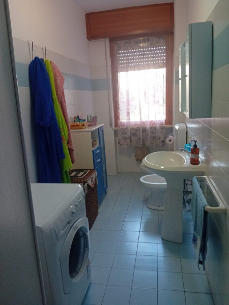 Ingrandisci la foto