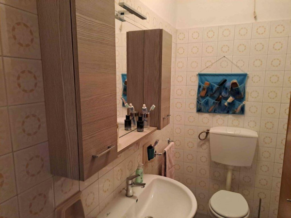 Ingrandisci la foto