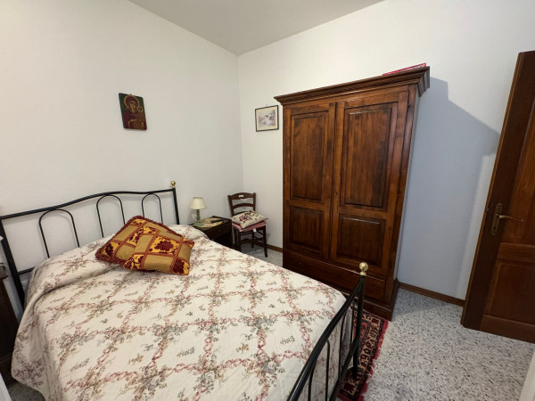 Ingrandisci la foto