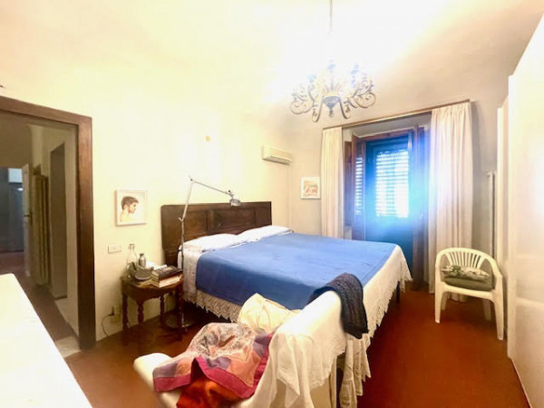 Ingrandisci la foto