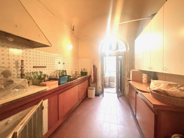 Ingrandisci la foto