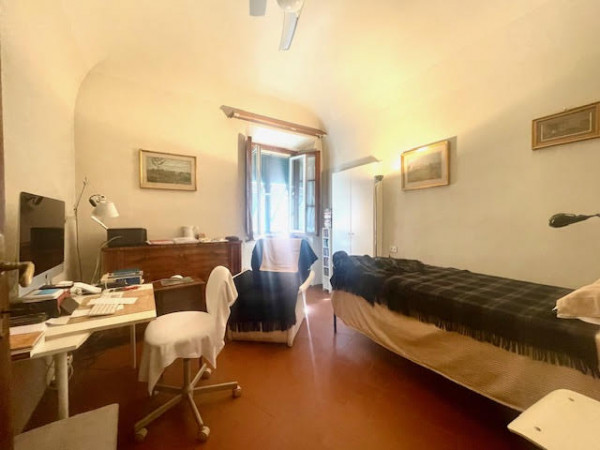 Ingrandisci la foto
