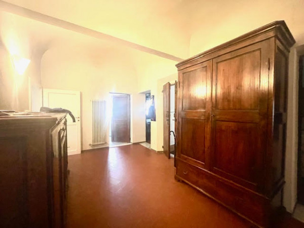 Ingrandisci la foto