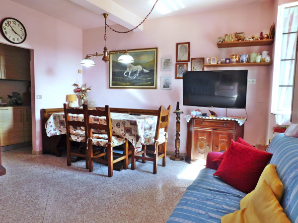 Ingrandisci la foto
