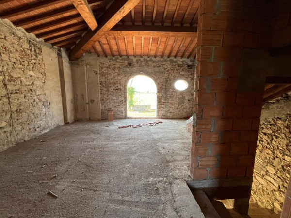 Ingrandisci la foto