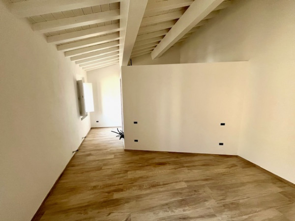 Ingrandisci la foto