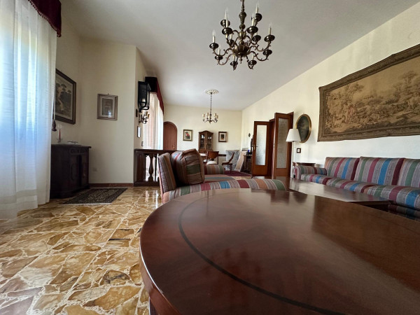 Ingrandisci la foto