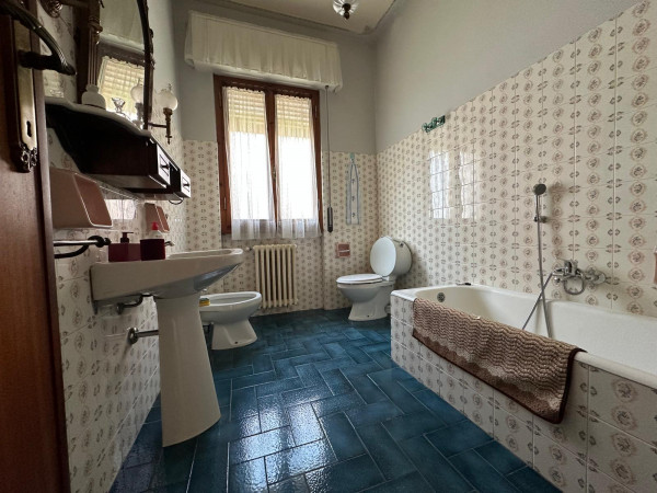 Ingrandisci la foto