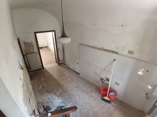 Ingrandisci la foto