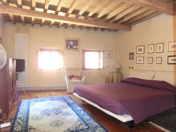 Ingrandisci la foto