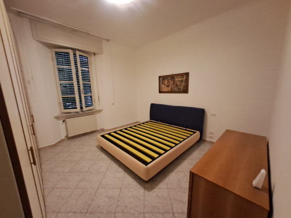 Ingrandisci la foto