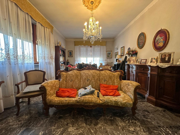 Ingrandisci la foto