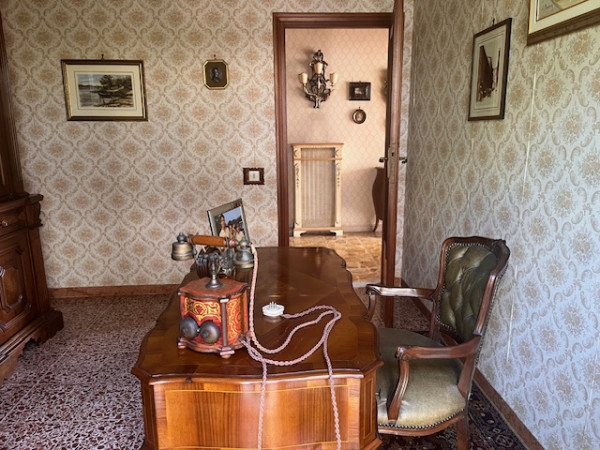 Ingrandisci la foto