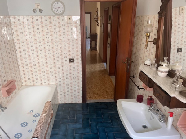 Ingrandisci la foto