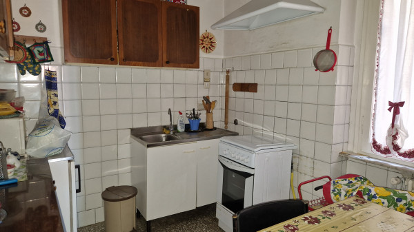 Ingrandisci la foto