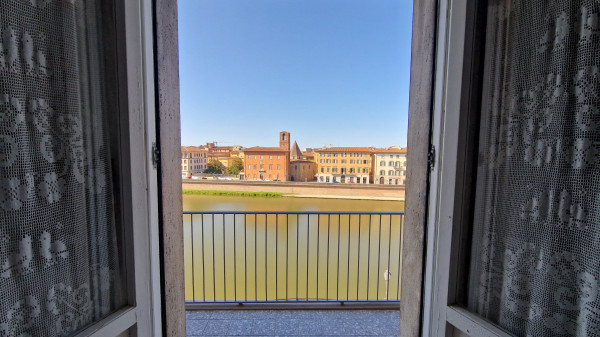 Ingrandisci la foto