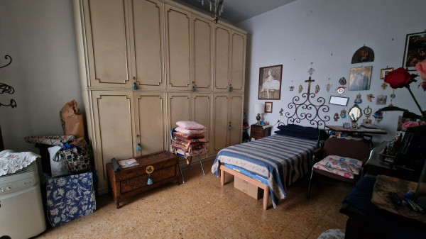 Ingrandisci la foto