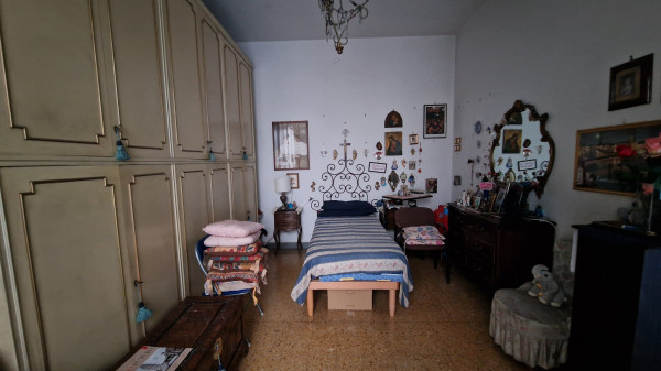 Ingrandisci la foto
