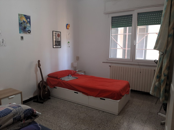 Ingrandisci la foto