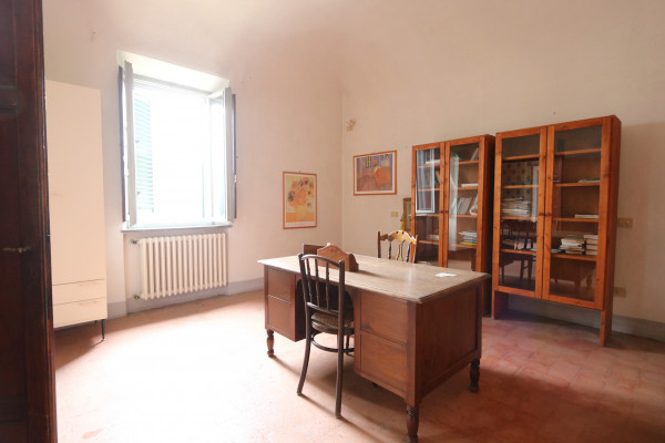 Ingrandisci la foto