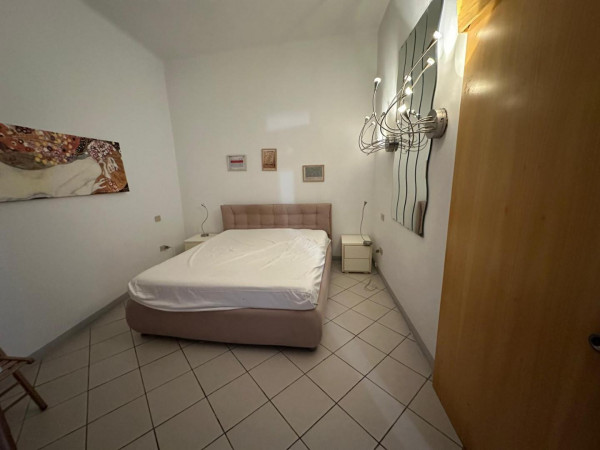 Ingrandisci la foto