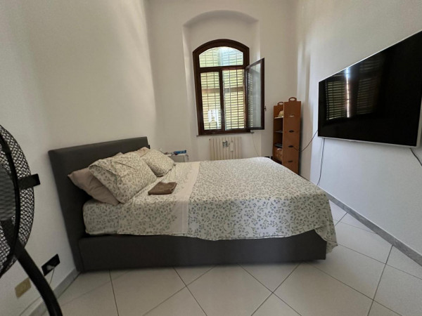 Ingrandisci la foto