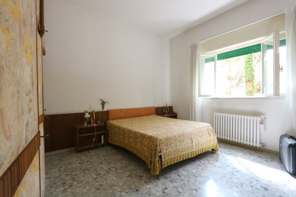 Ingrandisci la foto