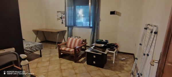 Ingrandisci la foto