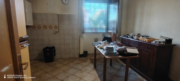 Ingrandisci la foto