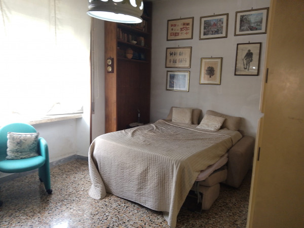 Ingrandisci la foto