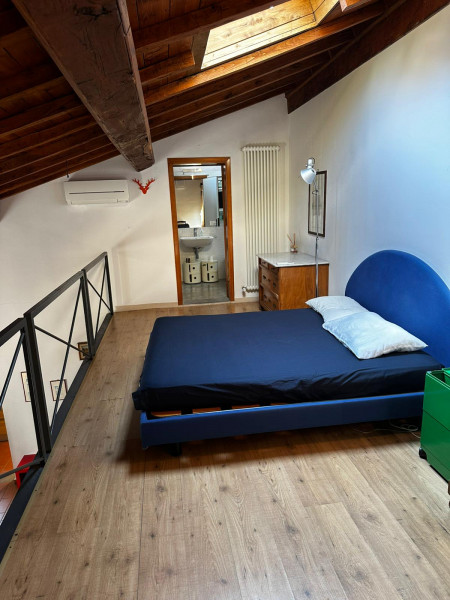 Ingrandisci la foto
