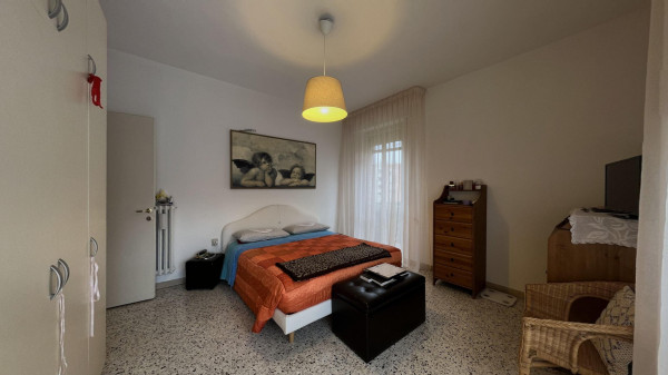 Ingrandisci la foto