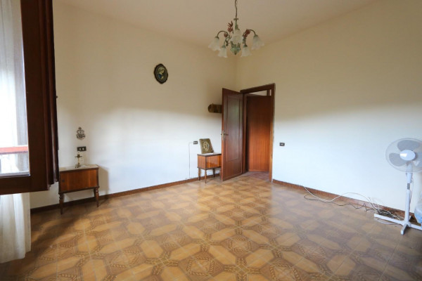 Ingrandisci la foto