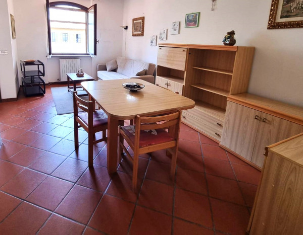 Ingrandisci la foto