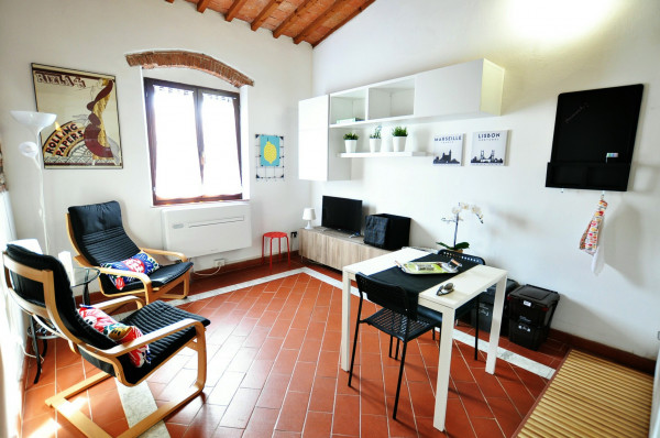 Ingrandisci la foto