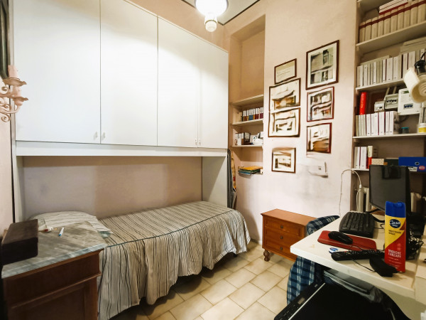 Ingrandisci la foto