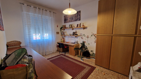 Ingrandisci la foto