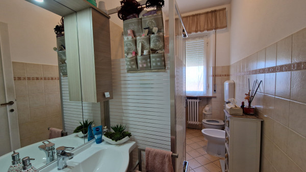 Ingrandisci la foto