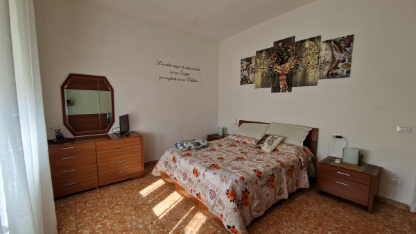 Ingrandisci la foto