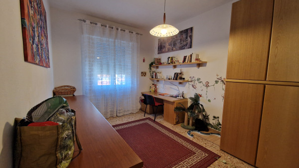 Ingrandisci la foto