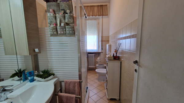 Ingrandisci la foto