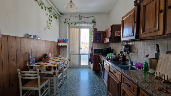Ingrandisci la foto